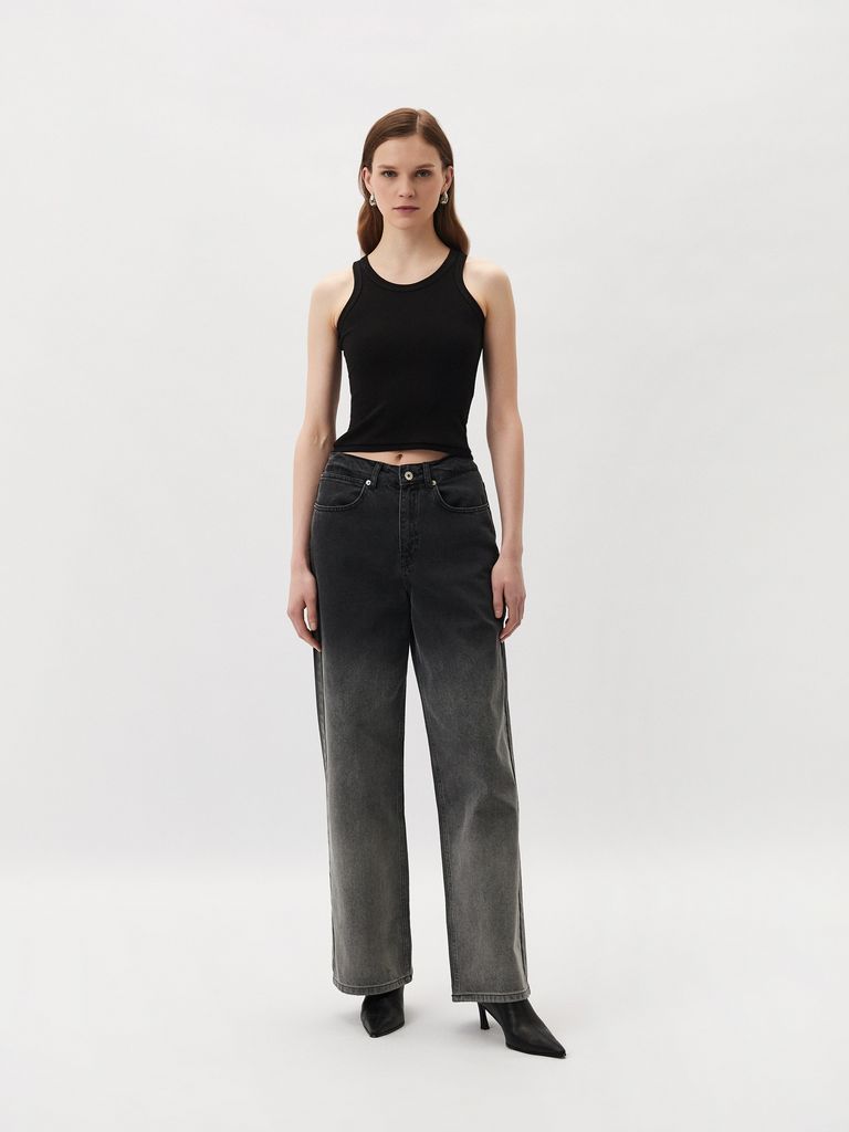 Sleeveless top with a metal logo badge