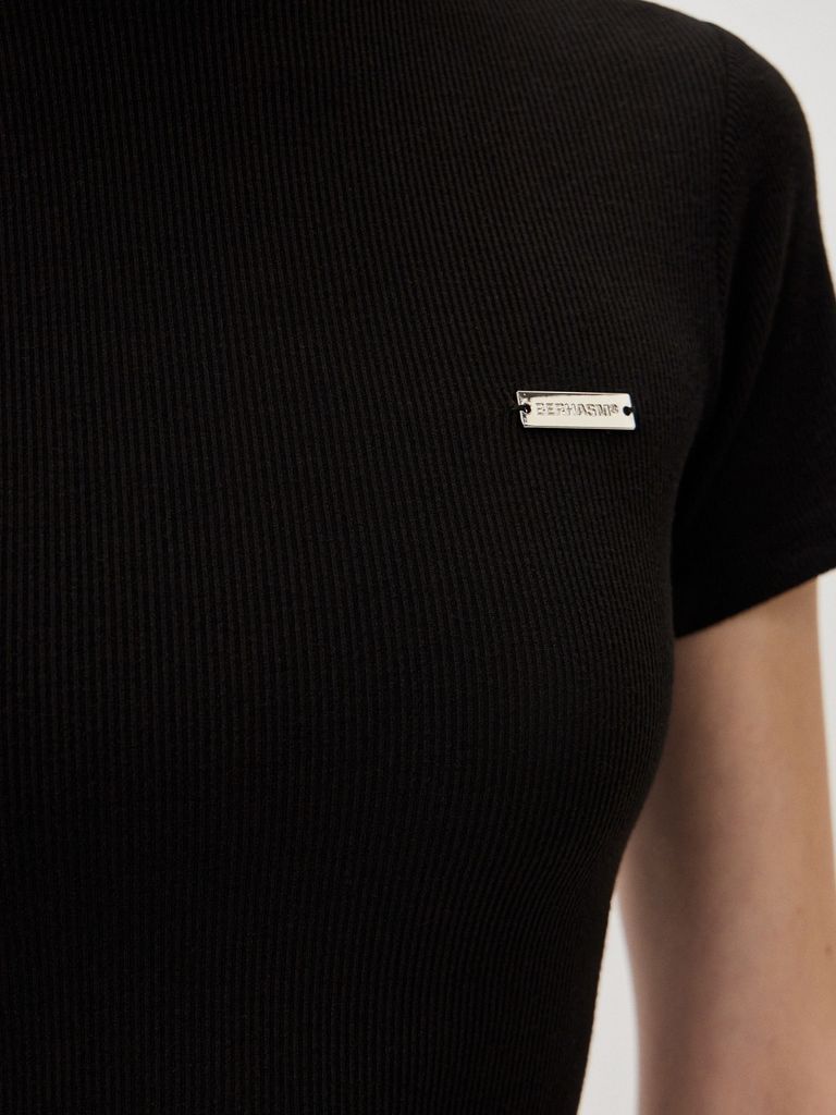 Top with a Silver Logo Badge